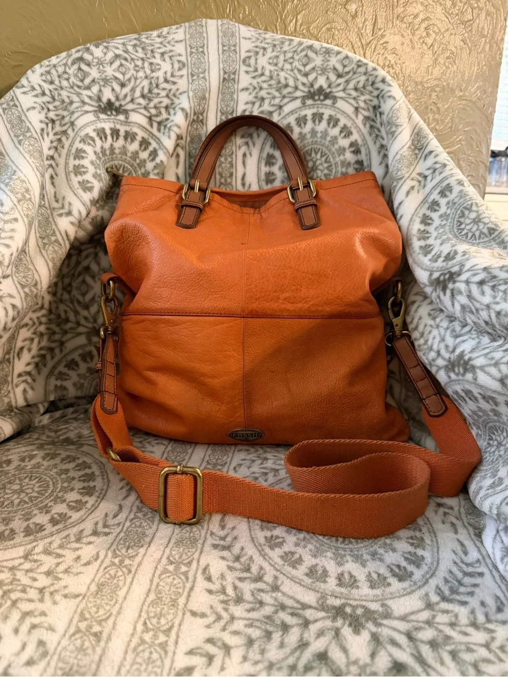 Fossil Explorer Fold Over Tote in orange on brass hardware